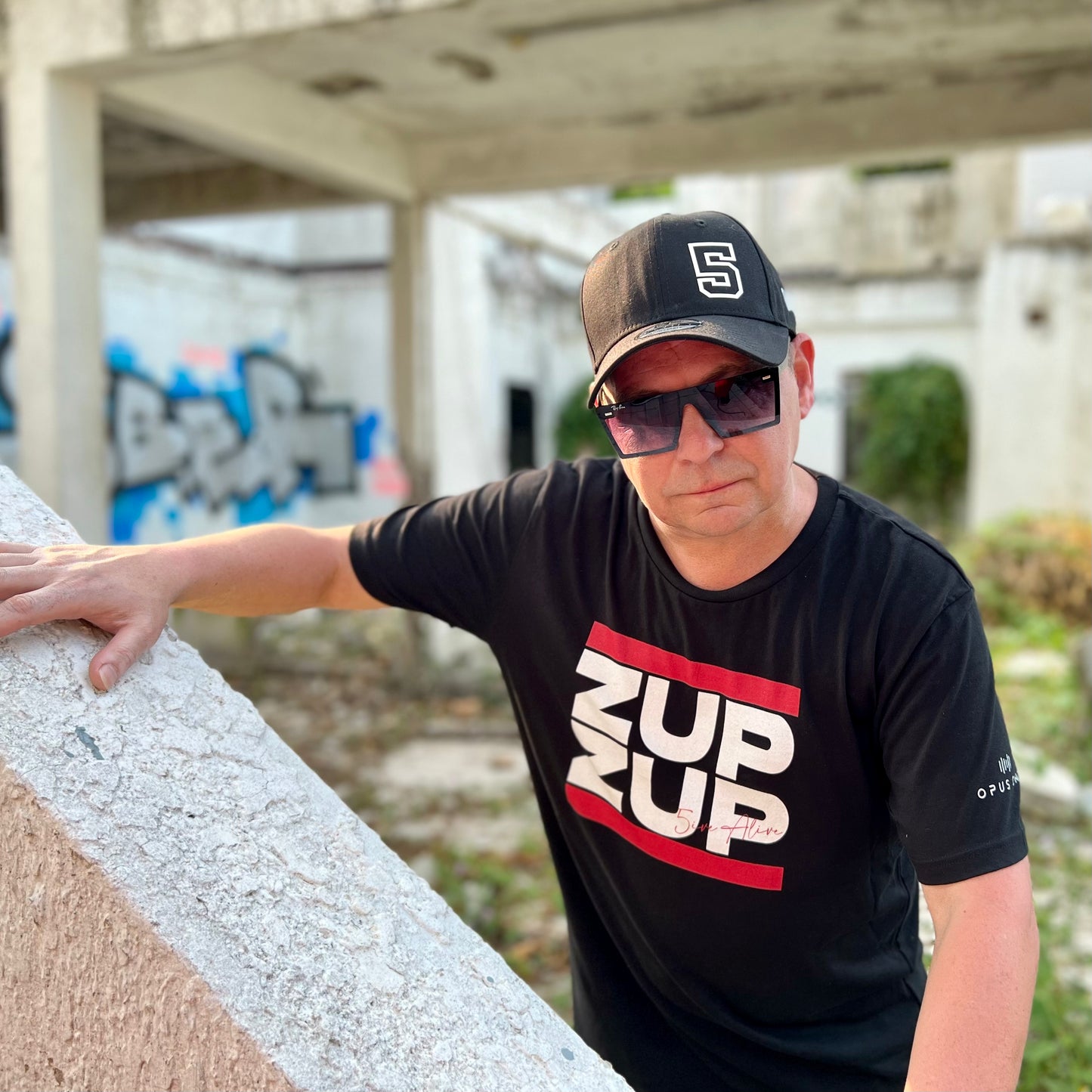 Signature Series (MC 5ive Alive 'Zup Zup') Unisex organic cotton t-shirt (White Text) MAIN FRONT PRINT